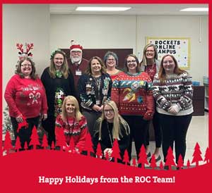 Staff dressed in holiday attire with words Happy Holidays from the ROC Team!