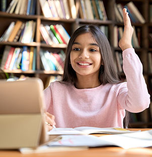 Girl raising her hand during online lecture